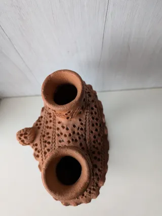 Candelabro de barro artesanal