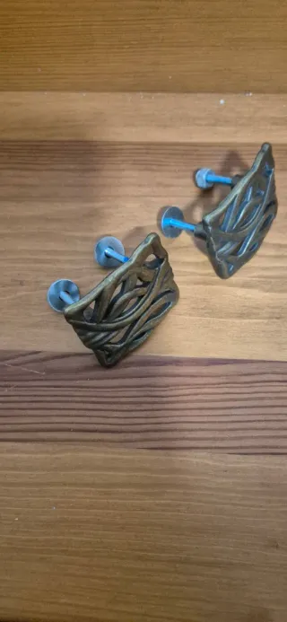 Tiradores ovalados de metal