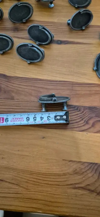 Tiradores ovalados de metal