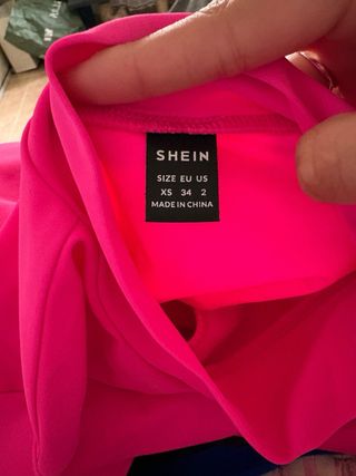 Body rosa fucsia cuello alto talla XS