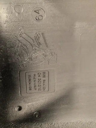 Silla elevadora de plástico.