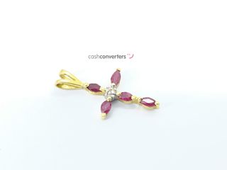 crucifijo oro 18k con piedra con rubi