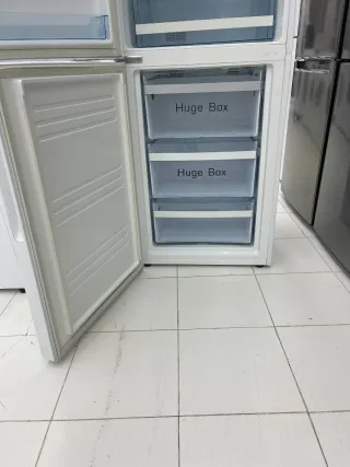 Nevera blanca Haier altura 1.88 con garantia