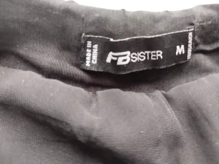 Shorts lentejuelas negro y plata