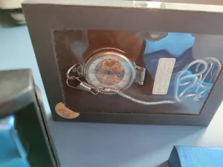 Lott di collezionismo: Petaca, Zippo, armonica