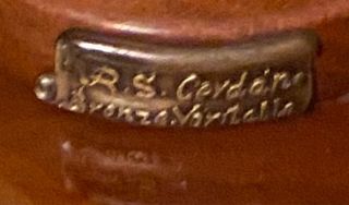 Bronce niño con peonza