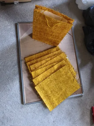 Bolsas de tela doradas con brillo