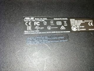 Portátil ASUS con golpe lateral