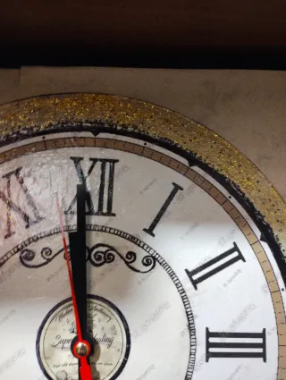 Orologio da parete decorato