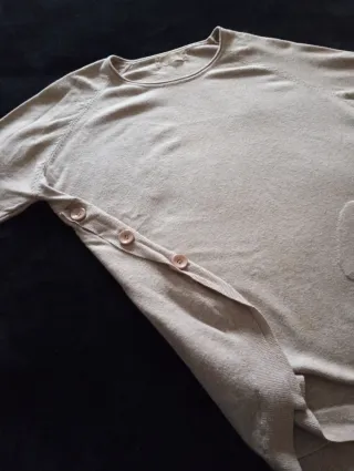Jersey beige con bolsillos