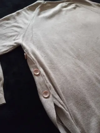 Jersey beige con bolsillos