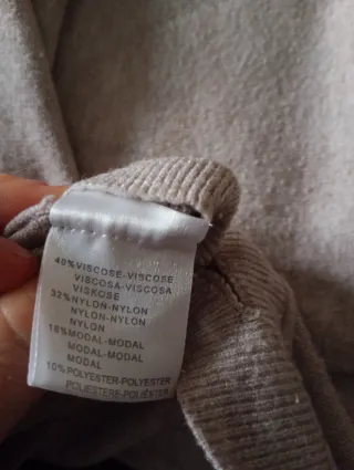 Jersey beige con bolsillos