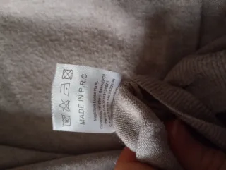 Jersey beige con bolsillos