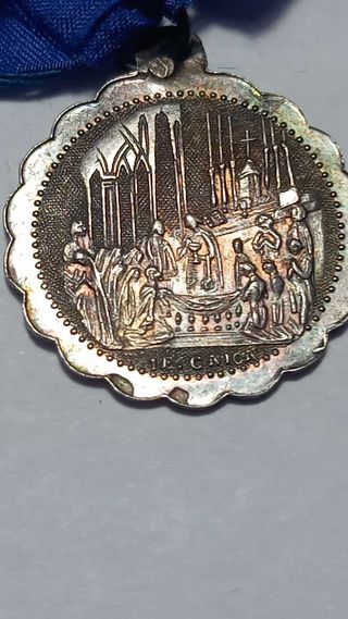 Medaglia con nastro blu