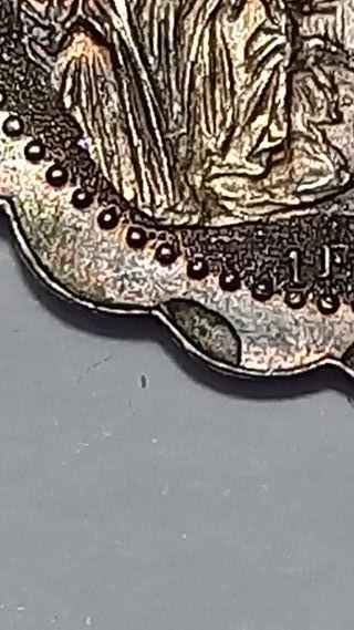 Medaglia con nastro blu