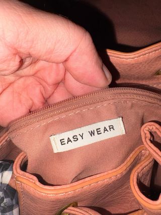 Mochila rosa con lazo