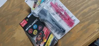 Beyblade BX-48 + Grip Rojo