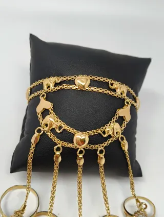 Manita de oro 18kt con 5 anillos lanzadera