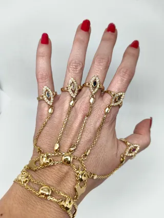 Manita de oro 18kt con 5 anillos lanzadera