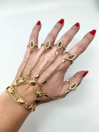 Manita de oro 18kt con 5 anillos lanzadera