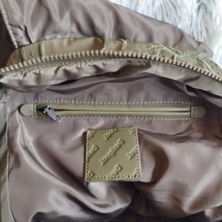 Mochila Desigual verde oliva con asa trenzada