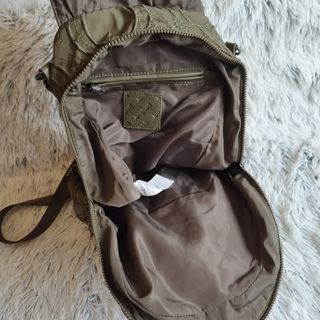 Mochila Desigual verde oliva con asa trenzada