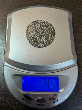 Moneda tibetana de plata 1 Tangka