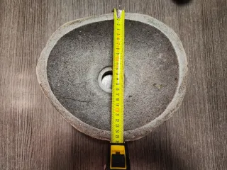 Lavabo ovalado de piedra de río