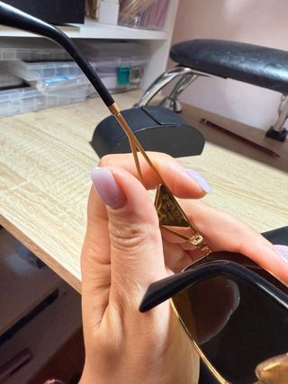 Gafas de sol Prada doradas originales