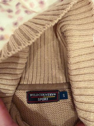 Jersey de punto trenzado color crema