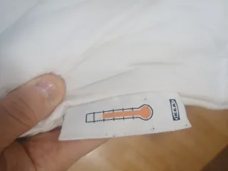 Edredón blanco cama matrimonio