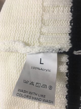 Chaleco de punto blanco con rayas