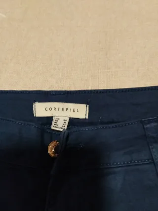 Pantalones pirata Cortefiel azul marino tachas