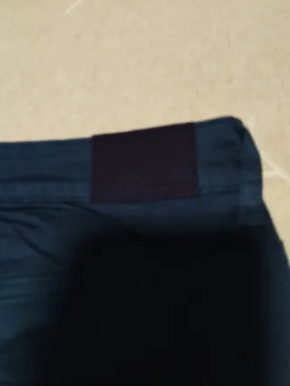 Pantalones pirata Cortefiel azul marino tachas