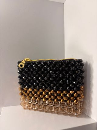 Monedero de cuentas hecho a mano