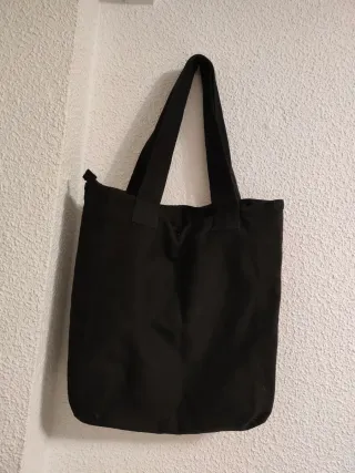Bolso Negro con Símbolo de Paz Rosa
