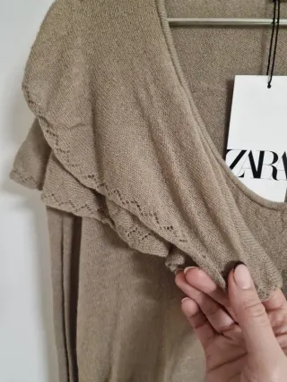 Top Zara beige con volantes