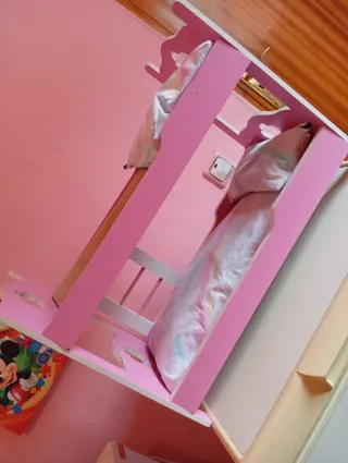 Cuna de muñecas rosa