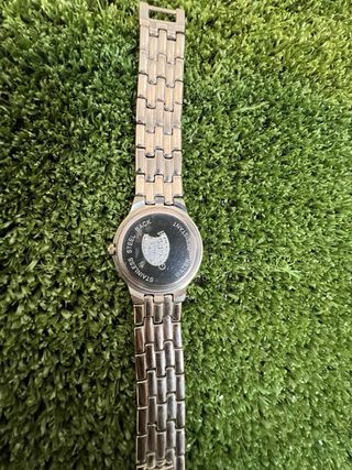 Reloj de hombre dorado y plateado