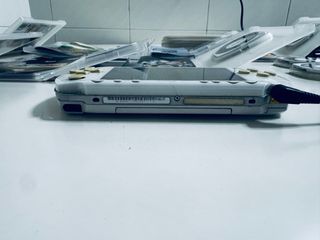 Lote PSP Blanca + 9 Juegos + Cargador + Funda