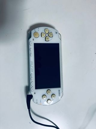 Lote PSP Blanca + 9 Juegos + Cargador + Funda