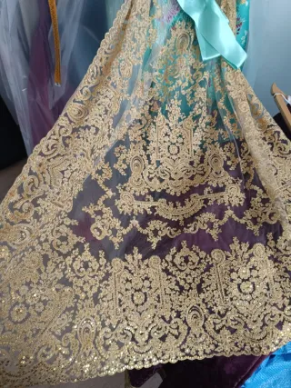 Manteletas de fallera doradas