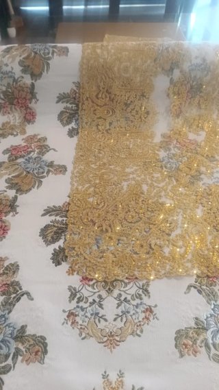 Manteletas de fallera doradas