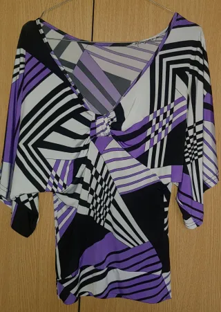 Maglia manica pipistrello fantasia geometrica