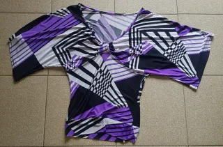 Maglia manica pipistrello fantasia geometrica