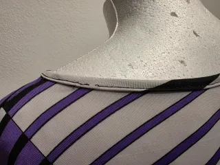 Maglia manica pipistrello fantasia geometrica