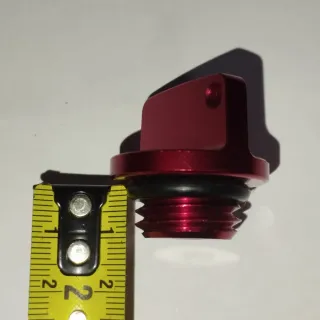 Tapón de aceite moto rojo