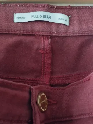 Pantalones vaqueros granate