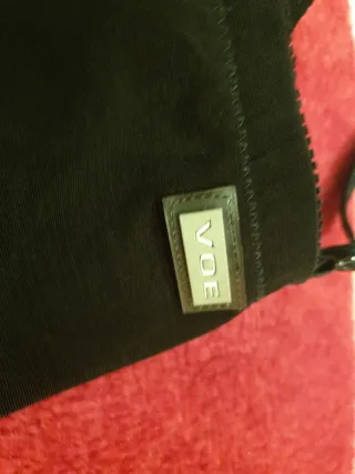 Mono negro lipotransferencia con tirantes