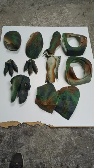 Piezas de dinosaurio camuflaje
